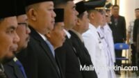 Barisan kepala dinas dan badan organisasi perangkat daerah OPD Pemkab Malinau berjas resmi pada pelantikan 2026 © MalinauTerkini.com